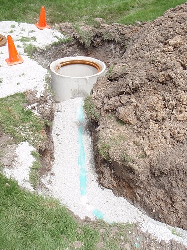 6" PVC was installed to drain the water collected in this catch basin.